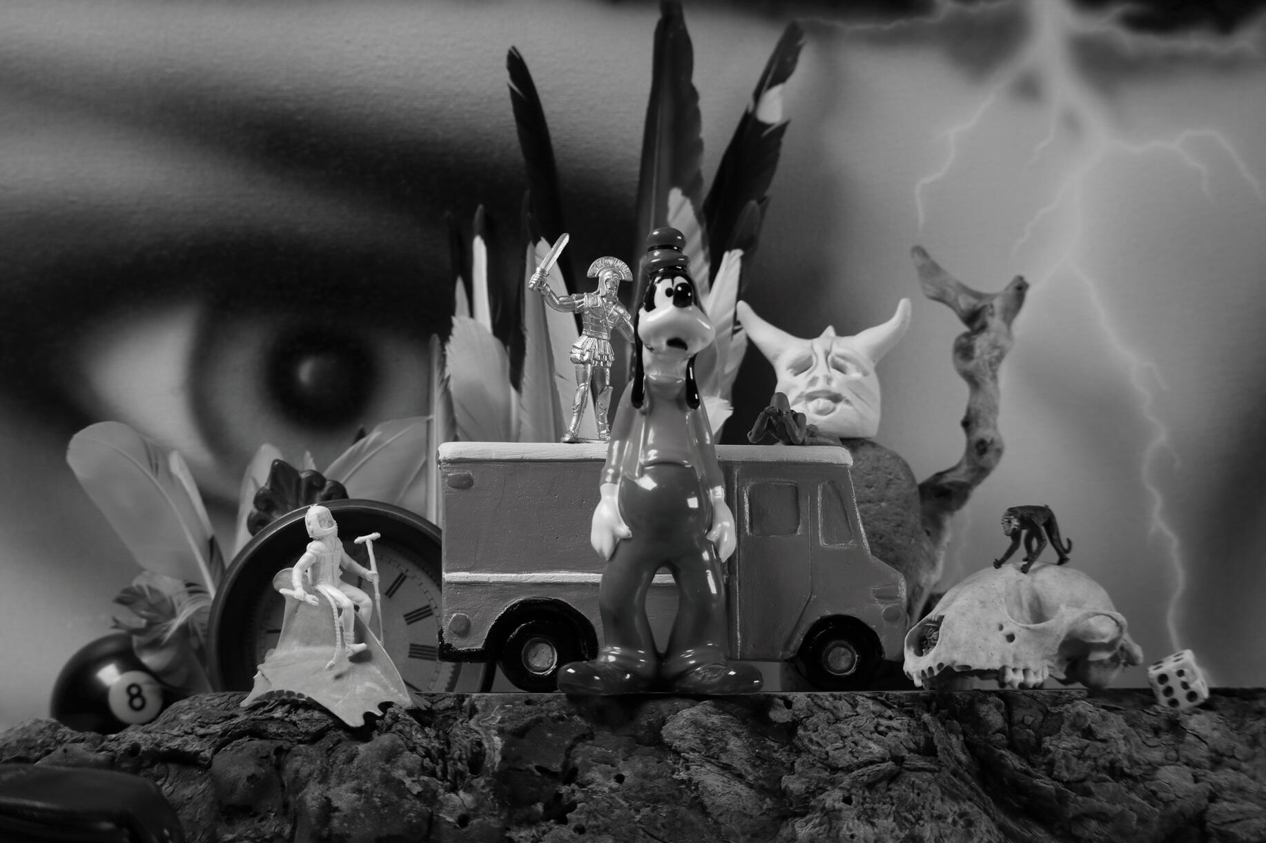 Goofy Attack: A fun black and white still life photograph I captured last winter with my large format Calumet 4x5 camera. All items included are things I have found or created over the past years.